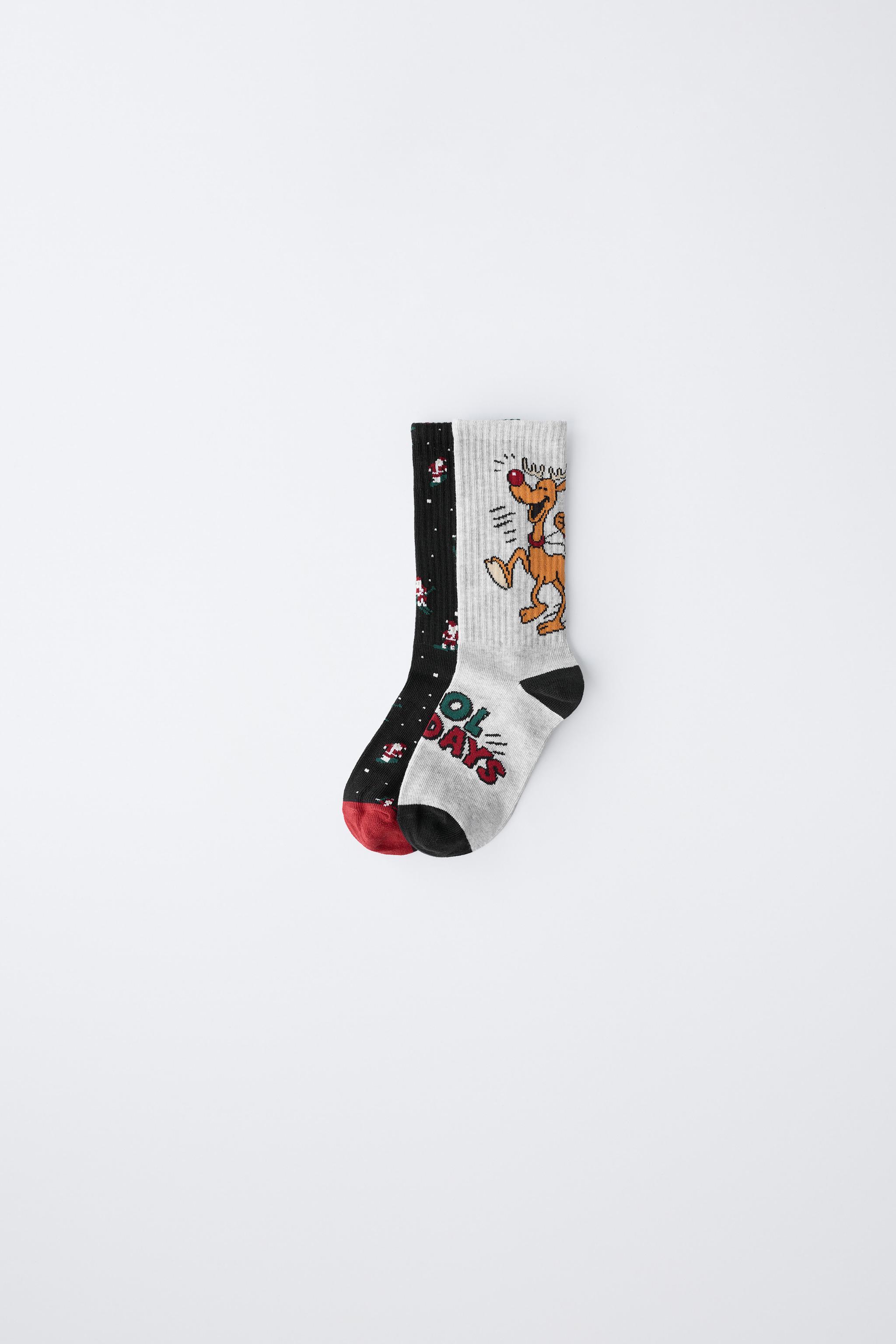 TWO-PACK OF SANTA CLAUS AND REINDEER LONG SOCKS